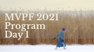 MVPF 2021 Program Day 1 man in blue coat walking across snow in front of field of wheat