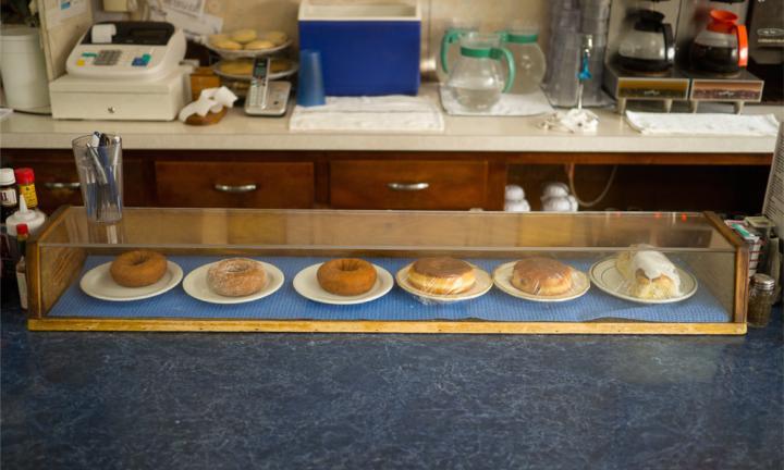 doughnuts in a case All Along the Yellowstone Trail Carl Corey
