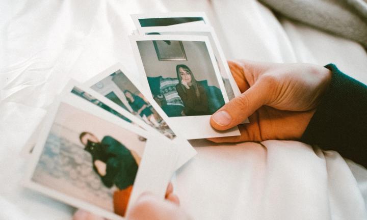 Polaroids with cat, man, woman; Photo by Lisa Fotios from Pexels