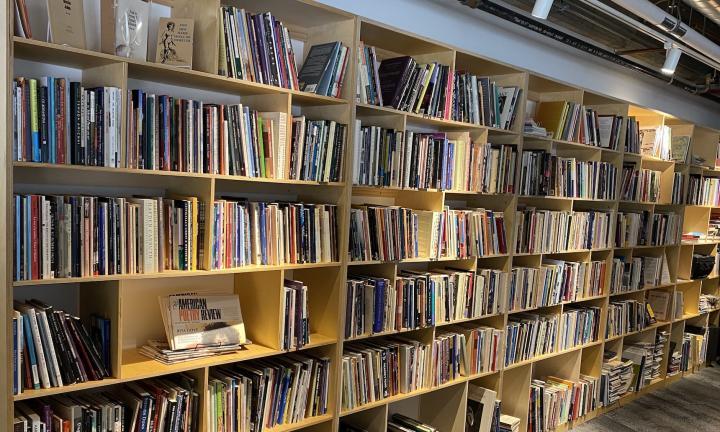 Ellen Kort Mezzanine Library shelves of poetry books