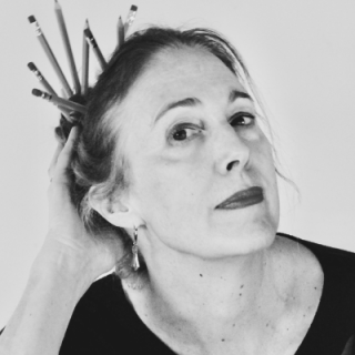 Poet Katrin Talbot with pencils in her hair