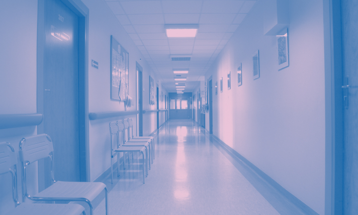 Photo of a hospital hallway with a blue filter